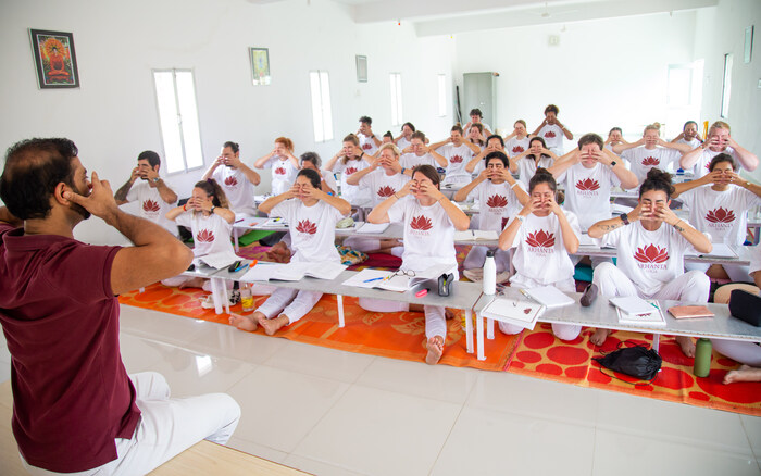 Yoga Teacher Teaches Pranayama Techniques at an ashram
