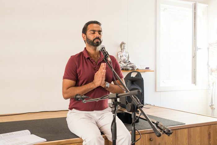A yoga teacher practices stillness