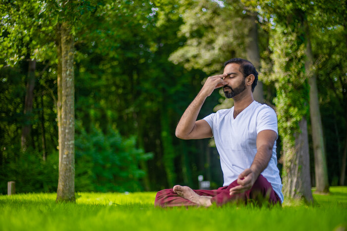 Yoga practitioner practice breathwork in silence