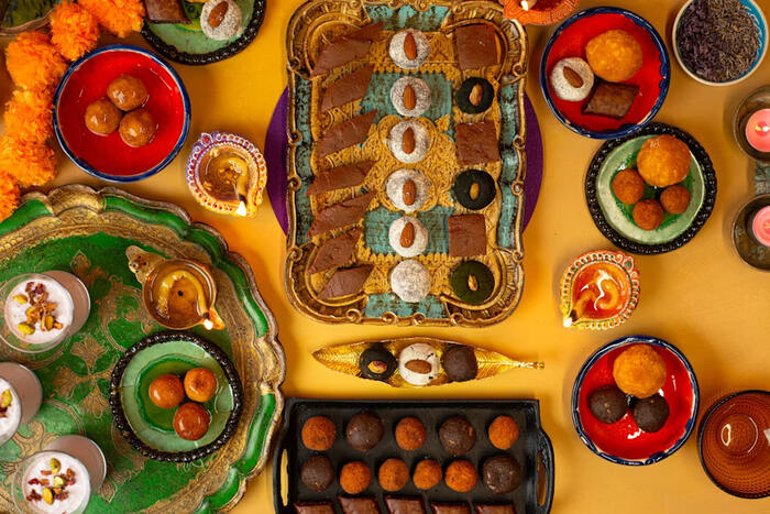 Diwali sweets and flower decorations Diwali sweets and flower decorations