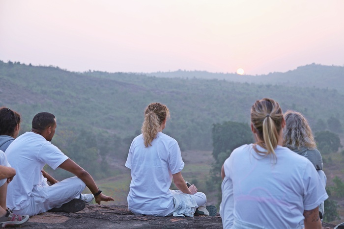 Yoga students watch the sunrise