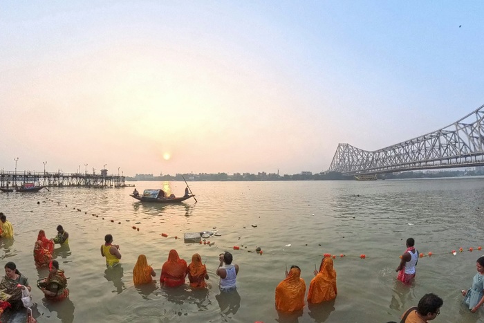 People worshiping the holy river ganga