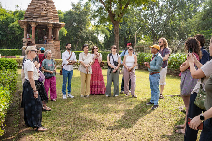 Yoga students visit a temple in India