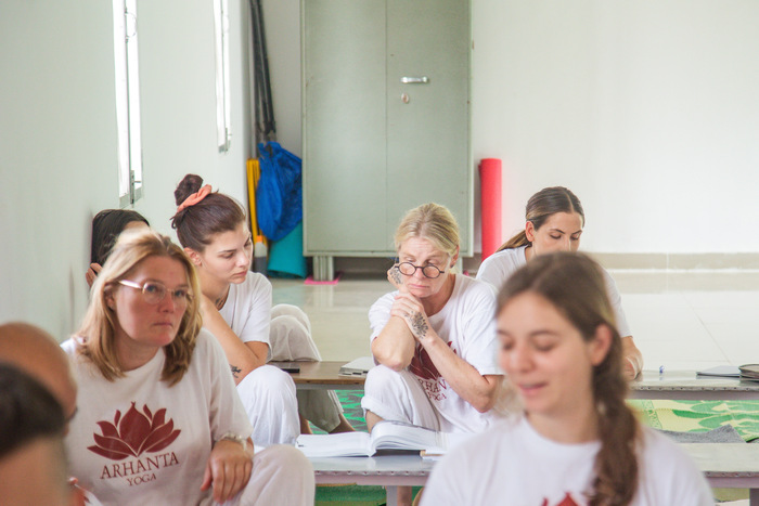 Students learning yoga philosophy at ashram Students learning yoga philosophy at ashram