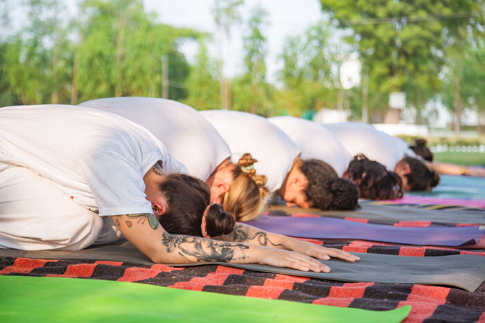 Yoga-practitioners-lie-face-down-in-Childs-Pose.jpg